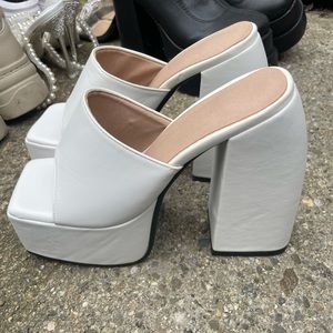 Chunky white platform heels